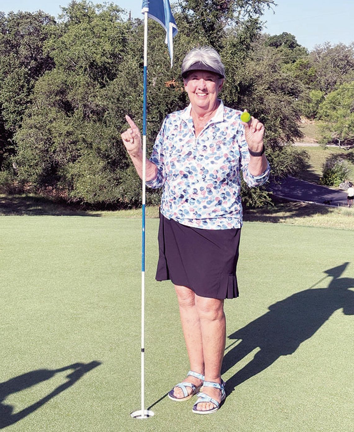 Dishman sinks hole in one