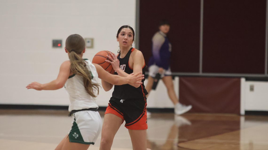 Lady Jackets Earn District Road Wins